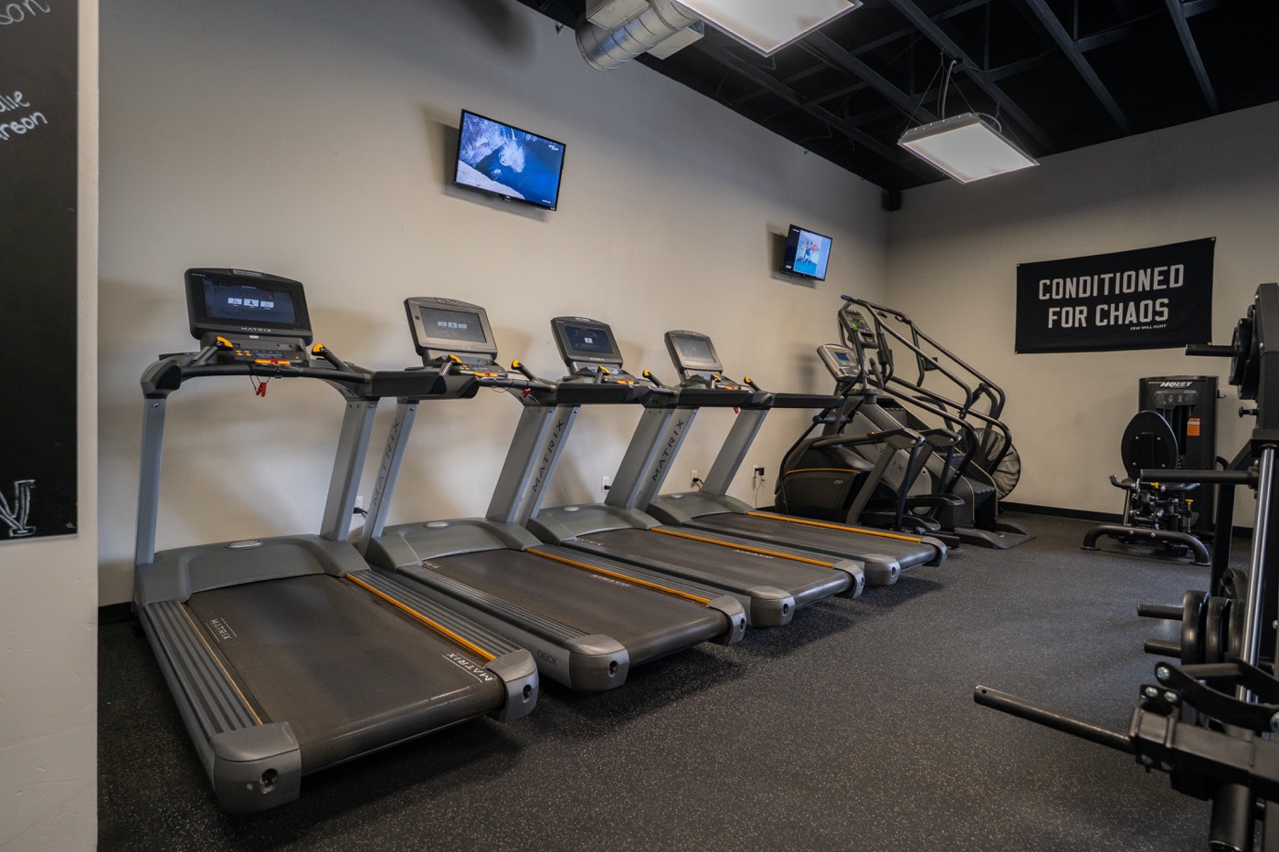 Row of treadmills and stair climbers
