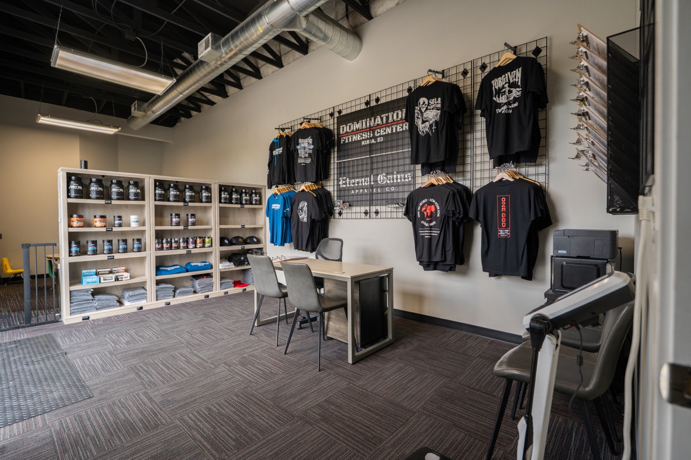 Domination apparel wall by the front desk